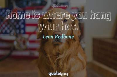 Photo Quote of Home is where you hang your hat.